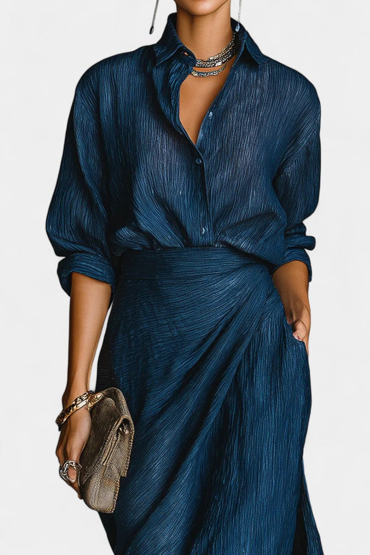 Romana Dark Blue Outfit Featuring a Light Shirt and Elegant Flowing Maxi Skirt