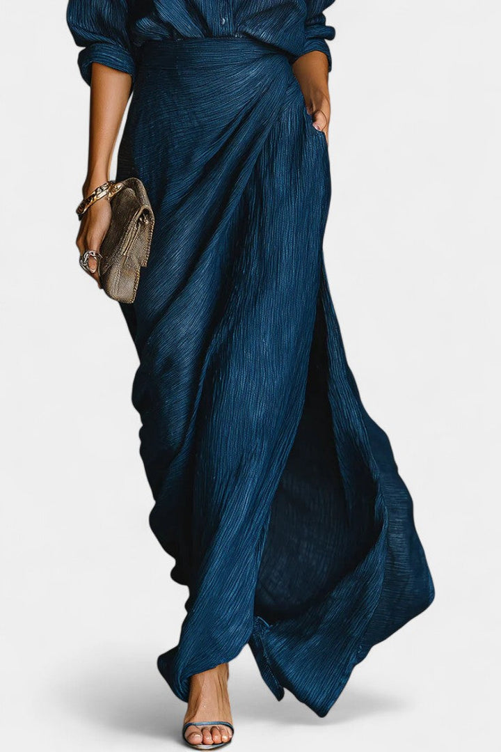Romana Dark Blue Outfit Featuring a Light Shirt and Elegant Flowing Maxi Skirt